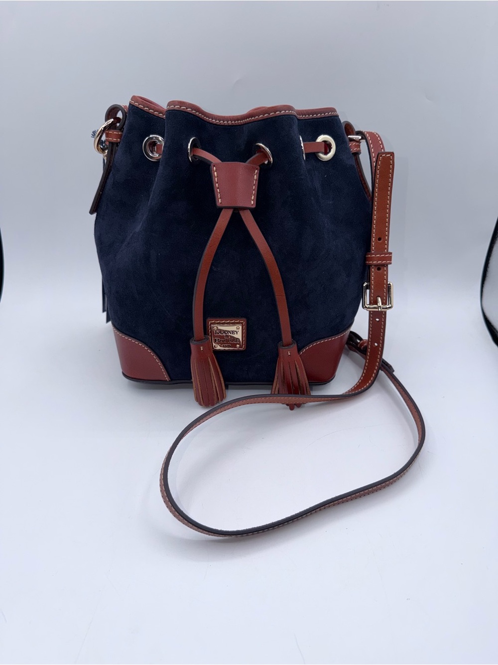 Dooney & Bourke Navy Suede and Brown Leather Drawstring Bucket Crossbody